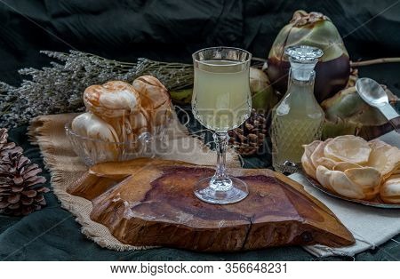 Fresh Toddy Palm Juice And Peel Toddy Palm At Front Of Dark Background. Selective Focus.