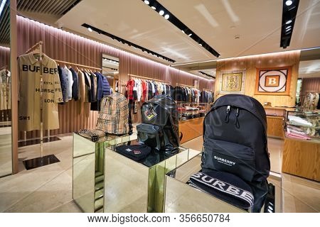 SINGAPORE - APRIL 21, 2019: interior shot of Burberry store in Singapore Changi Airport. Burberry Group PLC is a British luxury fashion house headquartered in London, England.