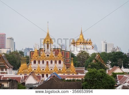Loha Prasat Wat Ratchanatda And Golden Mountain Pagoda, A Buddhist Temple Or Wat Saket With Skyscrap