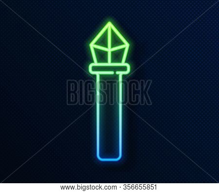 Glowing Neon Line Magic Staff Icon Isolated On Blue Background. Magic Wand, Scepter, Stick, Rod. Vec