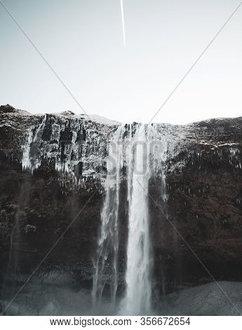Famous Seljalandsfoss Waterfall On Iceland During Winter