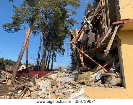 Ruined, Brick, Residential Building. The Ruins Of A Collapsed Mansion In The Forest. Demolition Of A