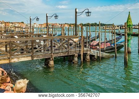 St. Mark Square, Venice, Italy - August 02, 2019: Traghetto Gondola Service Station Near Doge S Pala