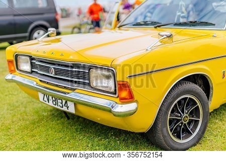 Bray, Ireland, June 2018 Bray Vintage Car Club Show, Open Air Retro Cars Display. Front View On Yell