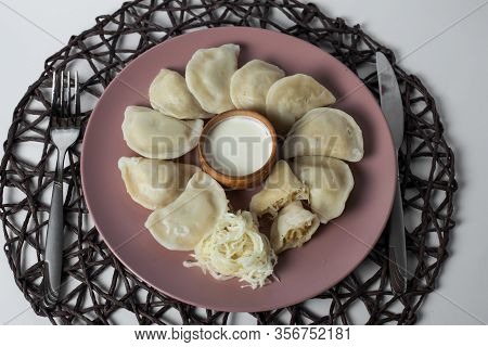 Dumplings With Stewed Cabbage, Homemade Traditional Ukrainian Dish Varenyky