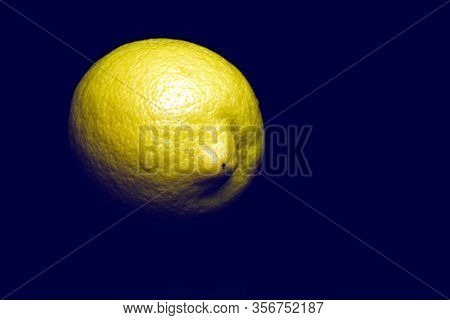 Fresh Juicy Yellow Snooty Lemon On A Black Background