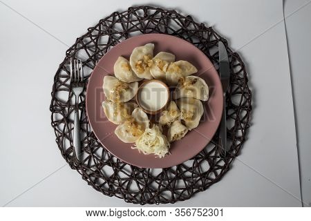 Dumplings With Stewed Cabbage, Homemade Traditional Ukrainian Dish Varenyky