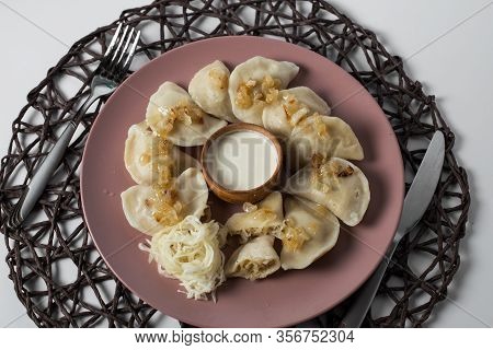 Dumplings With Stewed Cabbage, Homemade Traditional Ukrainian Dish Varenyky