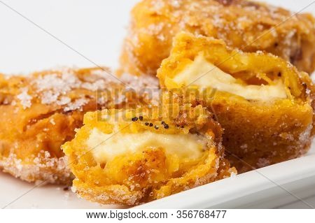 Typical Colombian Aborrajados Served On A White Dish