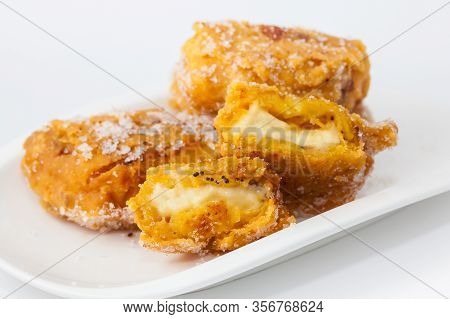Typical Colombian Aborrajados Served On A White Dish