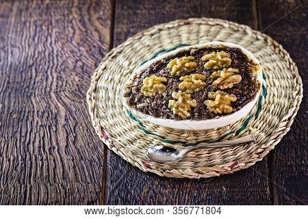 Chocolate Easter Egg With Icing And Nut Filling. Gourmet Easter Egg With Spoon, For Quaremsa Do Bras