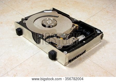 Broken Hard Drive On A Light Background.