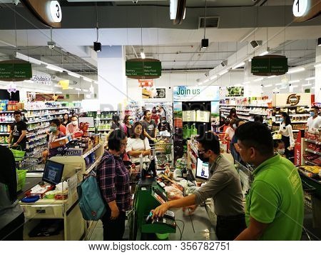 Kuala Lumpur, Malaysia, March 17 2020: COVID-19 Malaysian shoppers panic buying during announcement of coronavirus lockdown quarantine orders from the government.