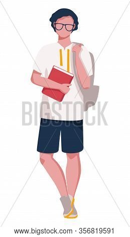 A Teenage Boy Wearing Glasses With A Backpack On His Shoulder And A Book In His Hand. A Young Studen