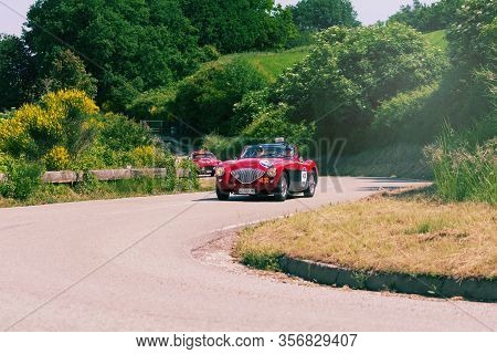Pesaro Colle San Bartolo , Italy - May 17 - 2018 : Austin Healey 100/4 Bn2 1956 On An Old Racing Car