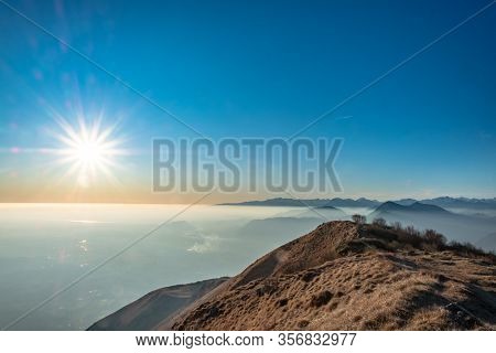 Winter Sunset From An Alpine Peak Of Friuli-venezia Giulia