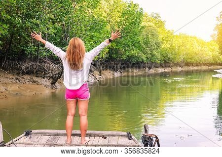 Travel Thailand. Young Tourist Woman/backpacker Standing On The Front Of Long Tail Boat - Popular To