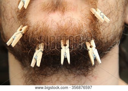 A White Man With A Beard And A Mustache, The Lower Part Of The Face With A Mouth, Lips And Chin, On 