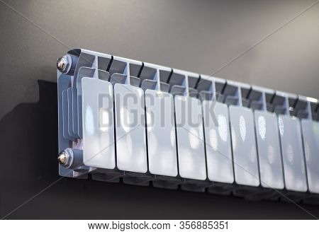 Water Heating Battery With Vertical And Horizontal Fins And End Nut. Convection And Heat Exchange.