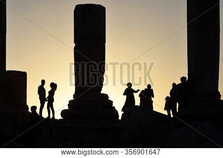 Amman, Jordan - February 15, 2020. Unidentified People At Sunset In Amman Citadel, Jordan. The Amman