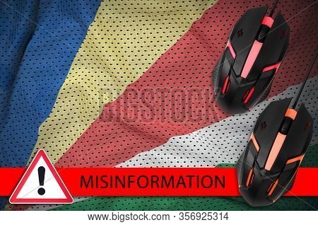 Seychelles Flag And Two Computer Mouses. Misinformation During Coronavirus Or 2019-ncov Virus Concep