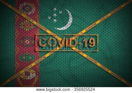 Turkmenistan Flag And Covid-19 Stamp With Orange Quarantine Border Tape Cross. Coronavirus Or 2019-n