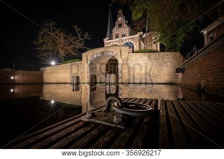 Old City Water Gate In The Historic Center Of The Frisian City Sneek