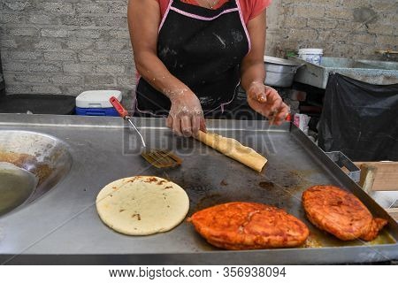 Old Woman Preparing A Typical Mexican Food