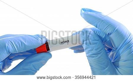 Hands In Gloves, Shows On Cam Medical Tube With Venous Blood. It Turns The Tube With Label H3n2 Viru