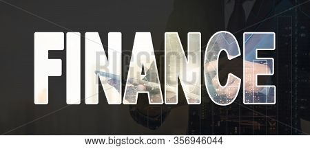 Finance Text Marking Of Double Exposure Of Businessman Using The Tablet With Cityscape And Financial