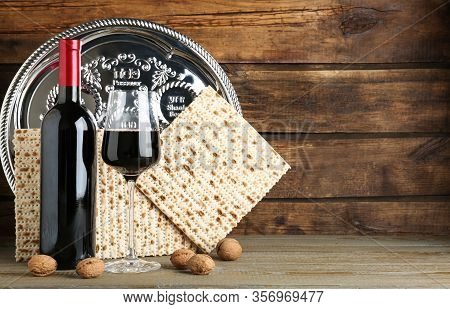 Composition With Passover Matzos On Wooden Table, Space For Text. Pesach Celebration