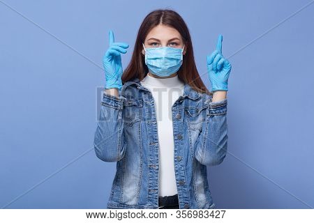Close Up Portrait Of Beautiful Woman Dresses White Shirt, Demin Jacket, ,blue Rubber Gloves And Flum