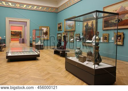 Manchester, Uk - April 21, 2013: People Visit Manchester Art Gallery In Manchester, Uk. Mag Is A Pub