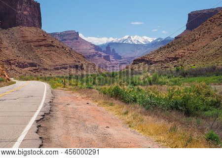 La Sal Peak, Mount Waas, Castle Mountain Covered In Snow On Distant Horizon, Viewed From Canyon Of C
