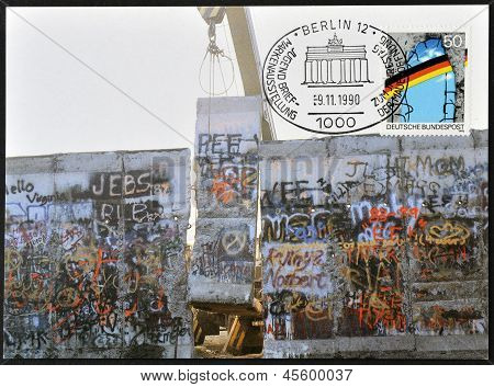 A stamp printed in Germany is dedicated to the first anniversary of the fall of the Berlin Wall