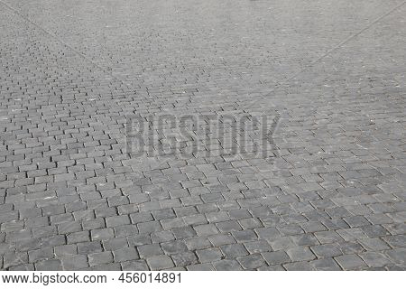 Background Of Many Cobbles Called Sanpietrini In Italian Language In The Square