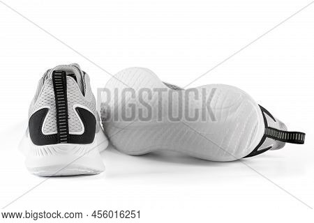 New Unbranded Running Sneaker Or Trainer Isolated On White Background. Men's Light Grai Sport Footwe