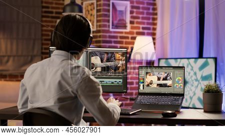 Graphic Designer Editing Video Montage On Production Software, Working On Computer To Add Visual Eff