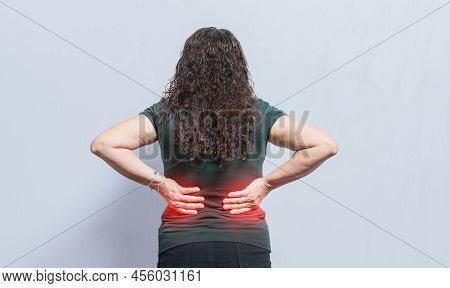 Person With Spine Problems, Woman With Back Problems On Isolated Background, Concept Of Woman With L