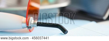 Close-up Of Stomatological Tool For Whitening Teeth In Clinic With Plastic Nozzle. Professional Inst
