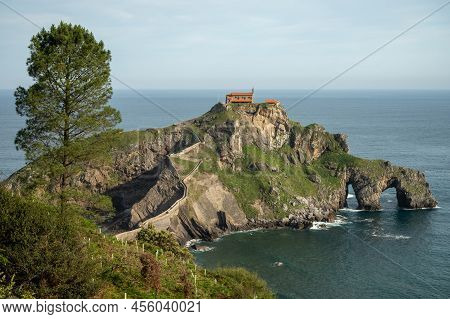 Stone Footpath To Famous Landmark And Film Location In North Of Spain, Ocean Islet With Chapel San J
