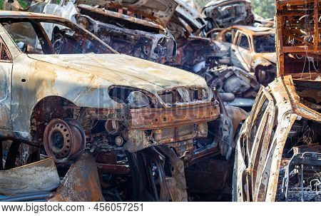 The Car Burned Down Completely, Even The Tires Burned Out. Burnt Out Car Crash After Fire. The Bomb