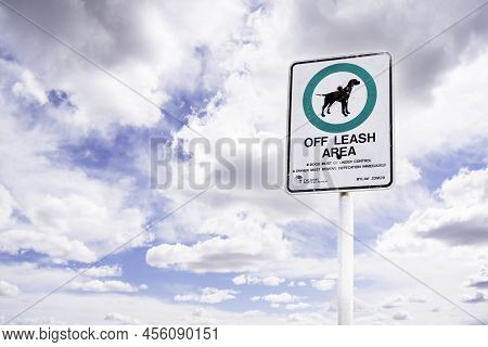 Calgary Alberta Canada, June 08 2022: An Off Leash Dog Park Sign Posted In A Public Location With Mu