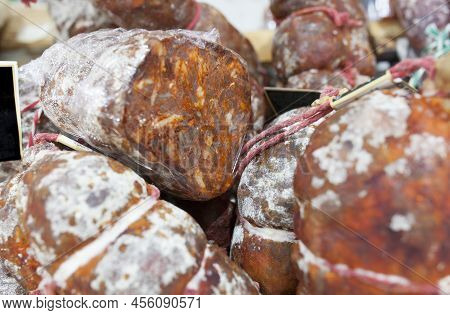 Iberian Morcon Displayed At Street Market Stall. Selective Focus