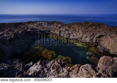 View Of The Lava Beach Of Linosa Called Piscine, Sicily. Italy