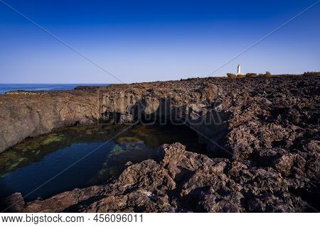 View Of The Lava Beach Of Linosa Called Piscine, Sicily. Italy