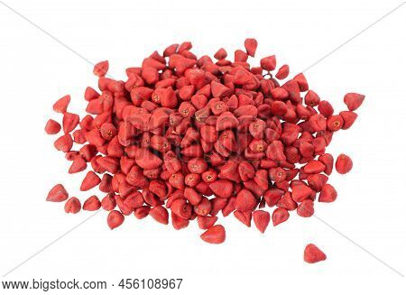 Annatto Seeds, Isolated On A White Background. Achiote Seeds, Bixa Orellana. Natural Dye For Cooking