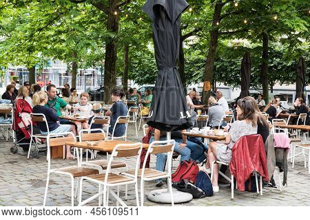 Brussels City Center, Brussels Capital Region - Belgium - 06 20 2020 People Sitting On A Terrace At 