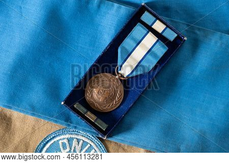 Richmond, North Yorkshire - March 4, 2022: Overhead Shot Of A United Nations Peacekeeper's Medal And