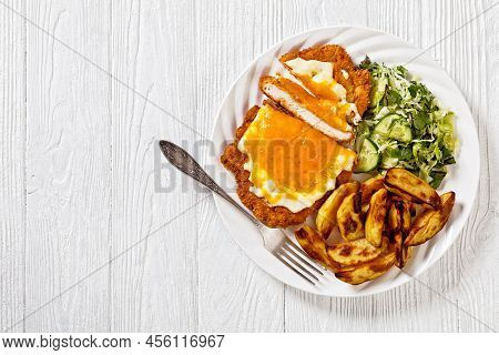 Chicken Parmo, Chicken Breast Cutlet Deep-fried In Breadcrumbs, Slathered With Bechamel Sauce And Me